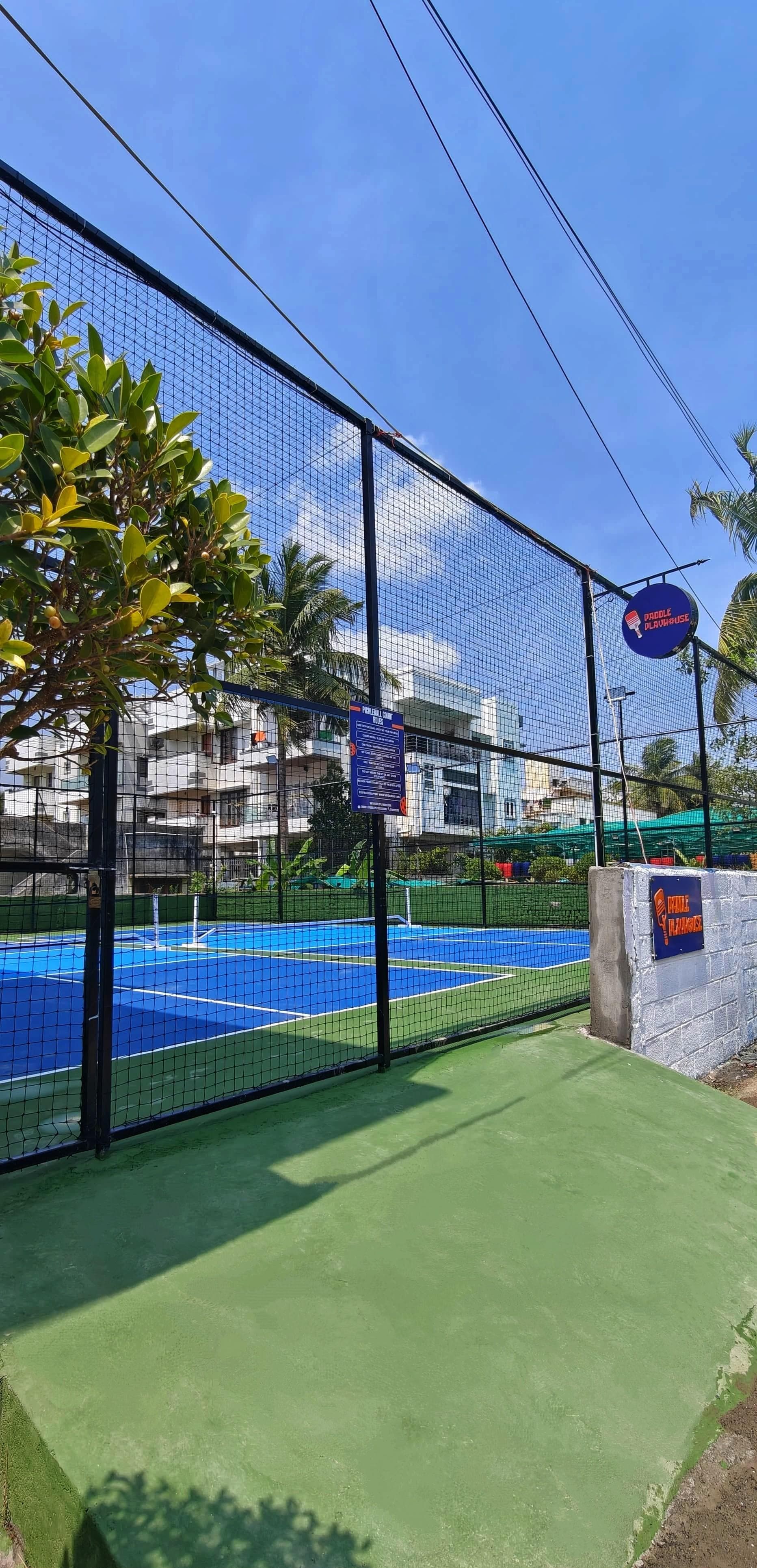 Surrounded by greens, breathe in the fresh air, feel the bounce and play a happy match.